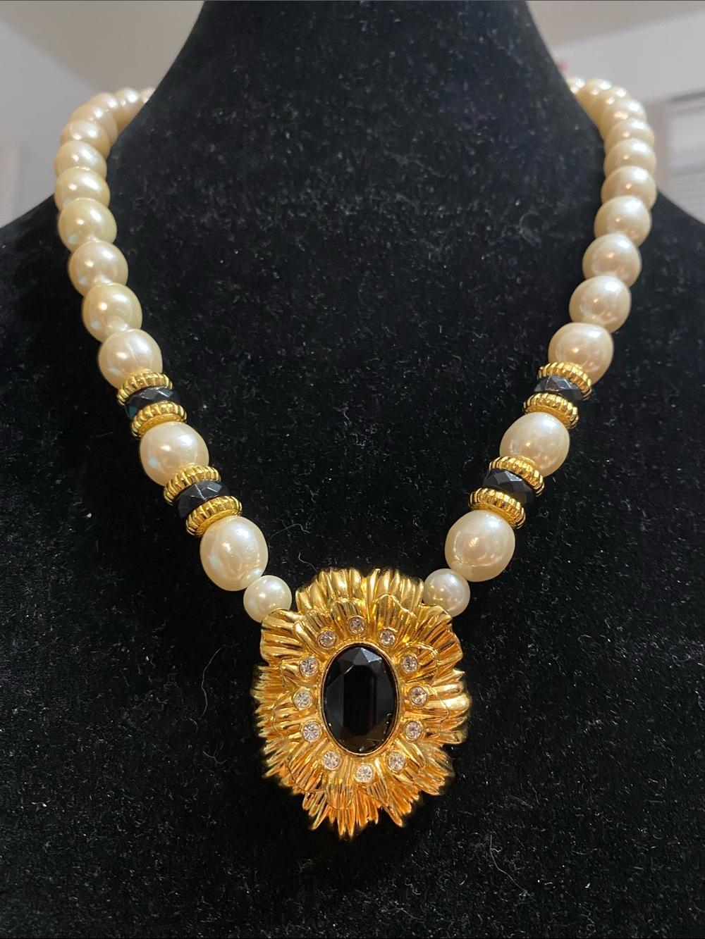 Kenneth Jay Lane by AvonIvory Pearl Necklace with Gold Sunburst and Black Center